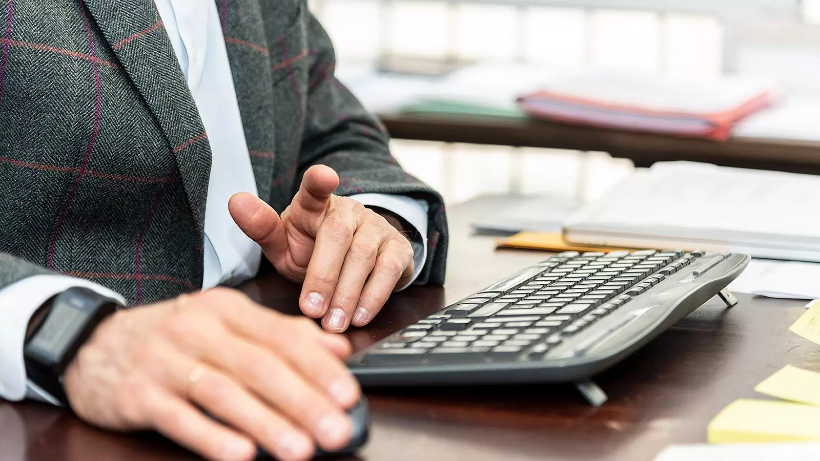 The hands of one of the Studio's chartered accountants